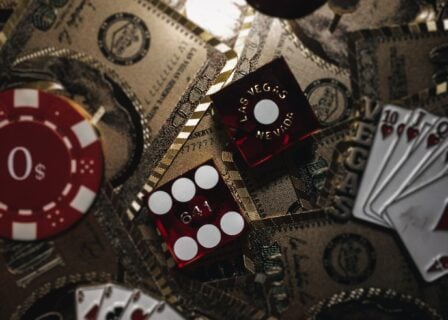an image of dice and poker chips