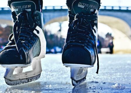 Ice hockey skates on ice